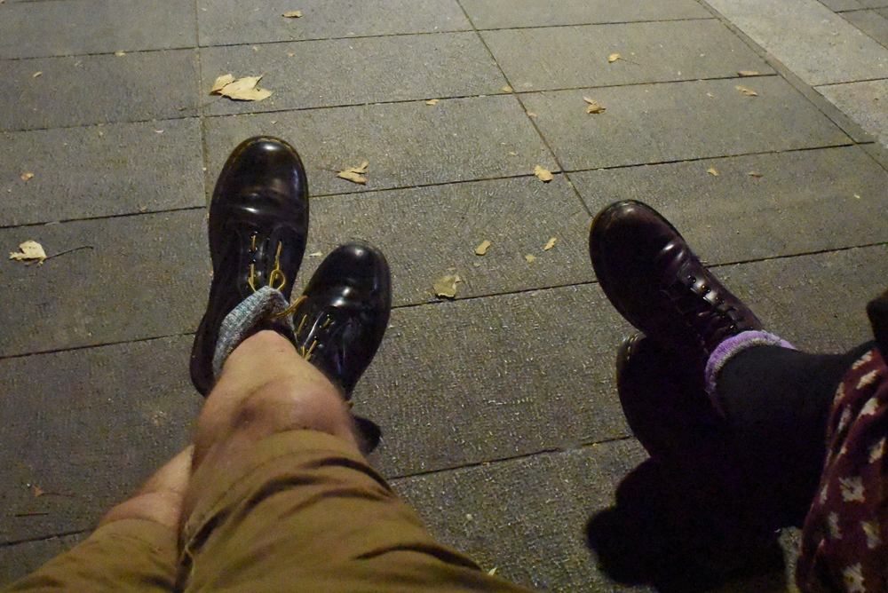 Pairs of Boots, pavement, 2023, Nikon D750 24mm