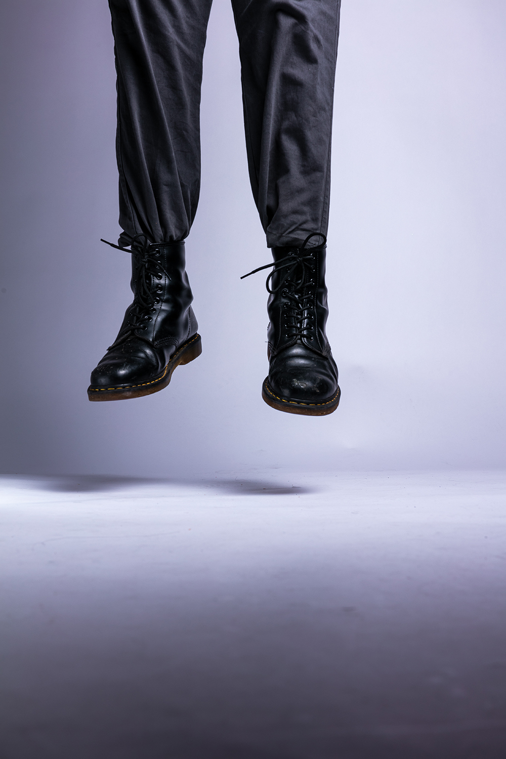 Hanging feet in Doctor Marten boots – part of Boots photo series